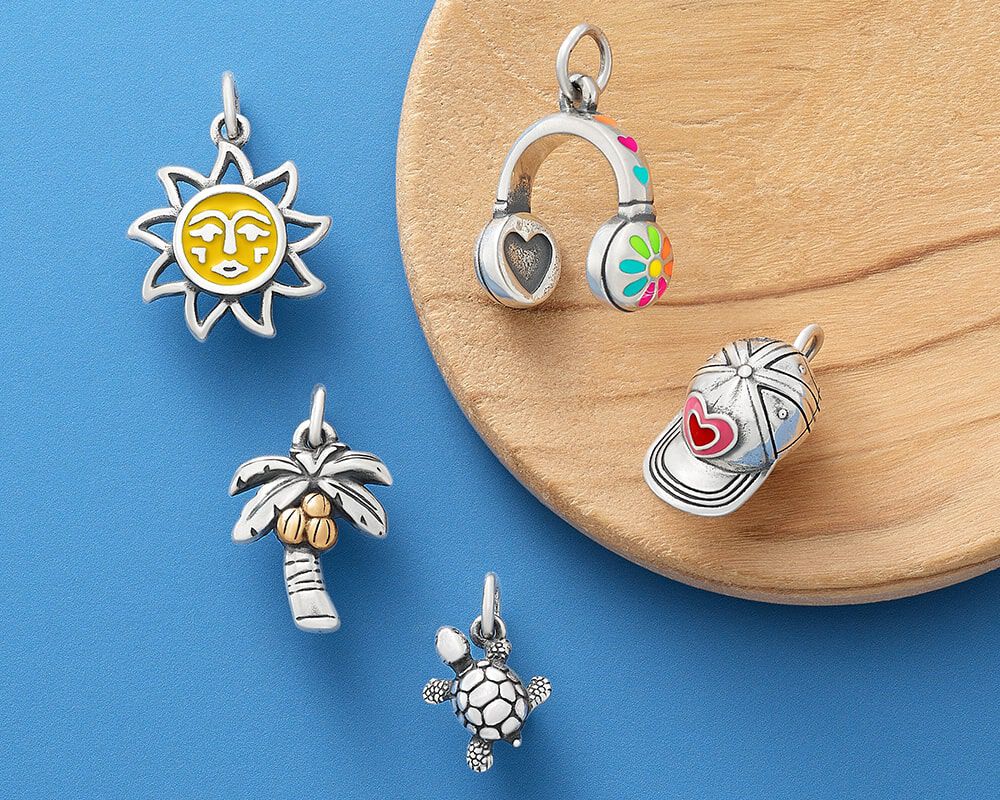 Sterling silver and enameled summer-themed charms.